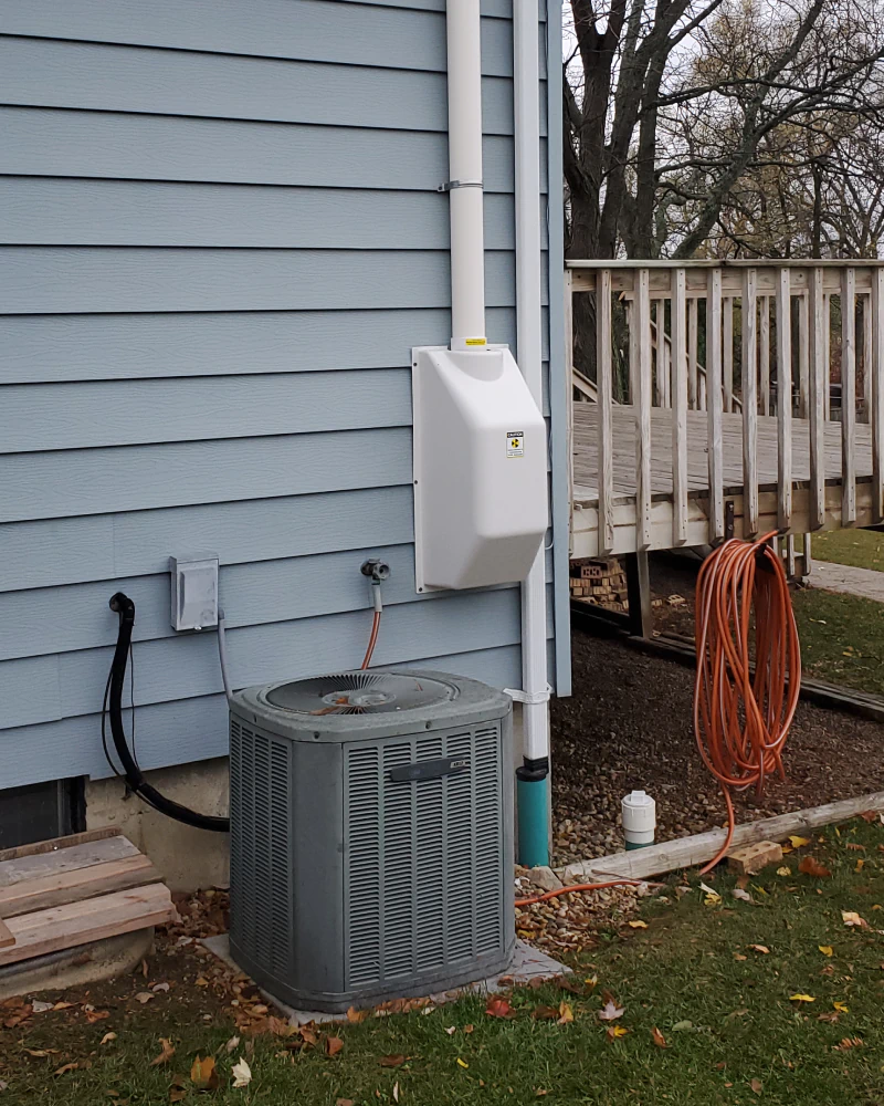 a house showcasing a newly installed radon mitigation system